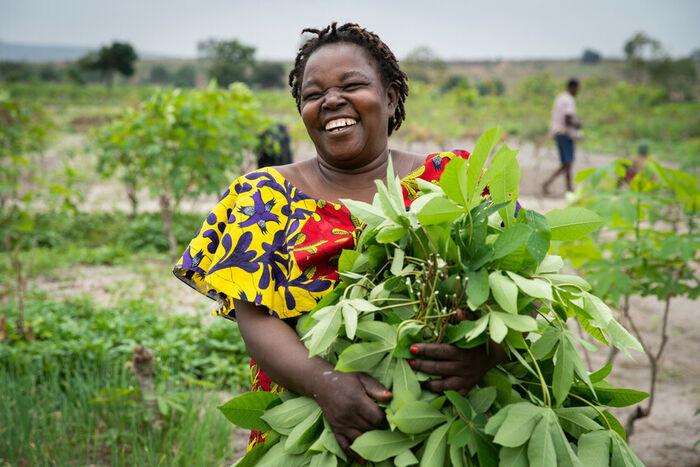 Image of Philomene at her farm on the outskirts of Kinshasa, DRC, who took part in financial and agricultural training. Image credit: Lisa Murray